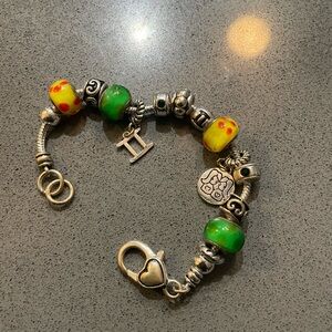 Silver Charm Bracelet with Yellow and Green Beads